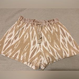 Aerie tribal print shorts. Pull on elastic waist with tassel tie. Pockets. Large